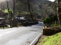Visiting biker airlifted to UK hospital after crash