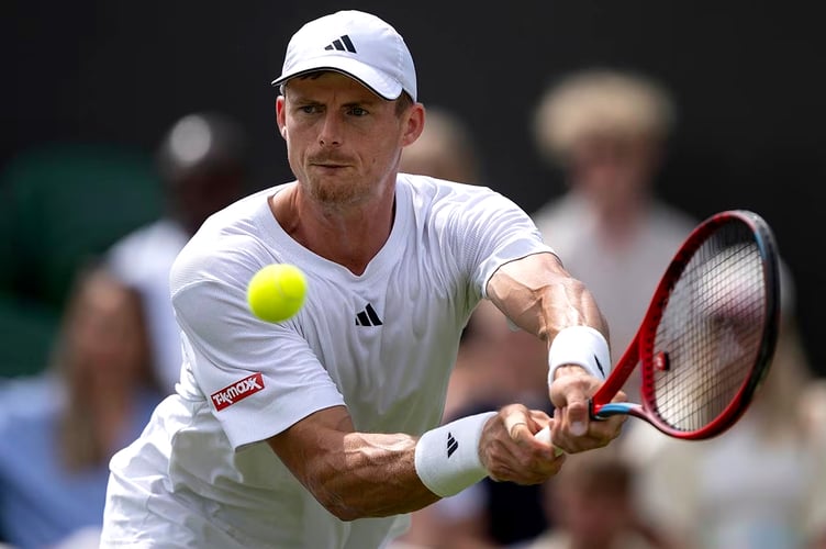 The Isle of Man's Billy Harris in action against Nuno Borges at Wimbledon last week (Photo: AELTC/Joel Marklund)