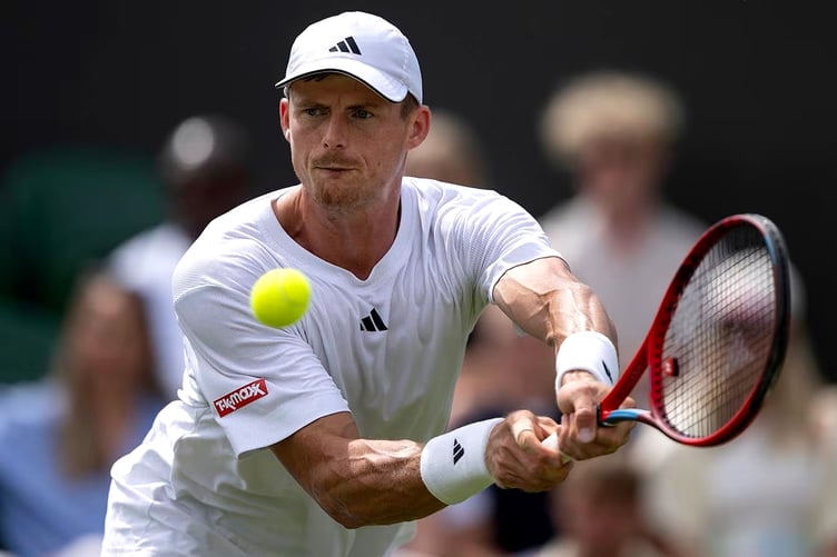 The Isle of Man's Billy Harris in action against Nuno Borges at Wimbledon last week (Photo: AELTC/Joel Marklund)