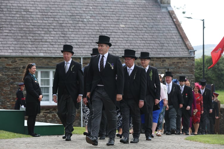 Chief Minister Alfred Cannan and fellow MHKs make their way towards Tynwald Hill