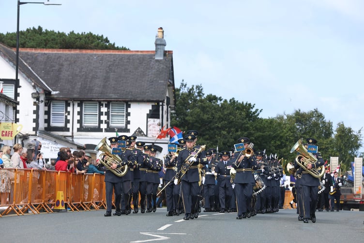 Onchan Silver Band make their way towards the Parish Church