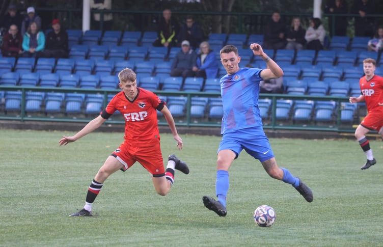 Ex-FC Isle of Man captain Sean Doyle (right) in action against his former club during the weekend's friendly at the Bowl (Photo: Paul Hatton)