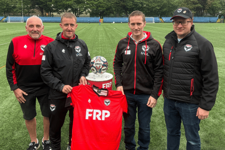 (Left to right:) FC Isle of Man director Andy Birchall, vice-chair Lee Dixon, Lawrence Looney and club treasurer Russ Kent