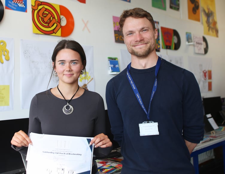 Overall winner for SQA Product Design Darcey Cairns, with teacher Mr Seddon