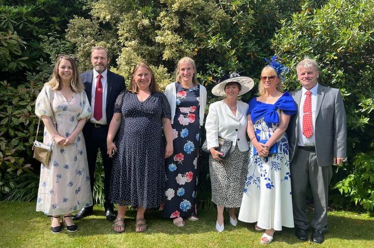 Members of the Marown Memorial Playing Fields charity looking smart at the Tynwald Garden Party