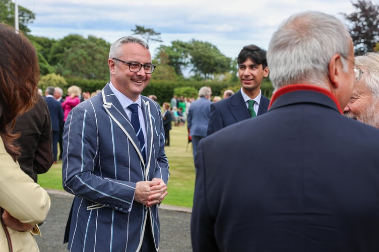 Speaker of the House of Keys Juan Watterson in a smart suit at the Tynwald Garden Party