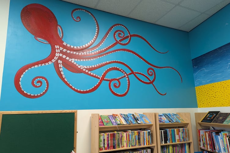 One section of the mural painted by Kate
