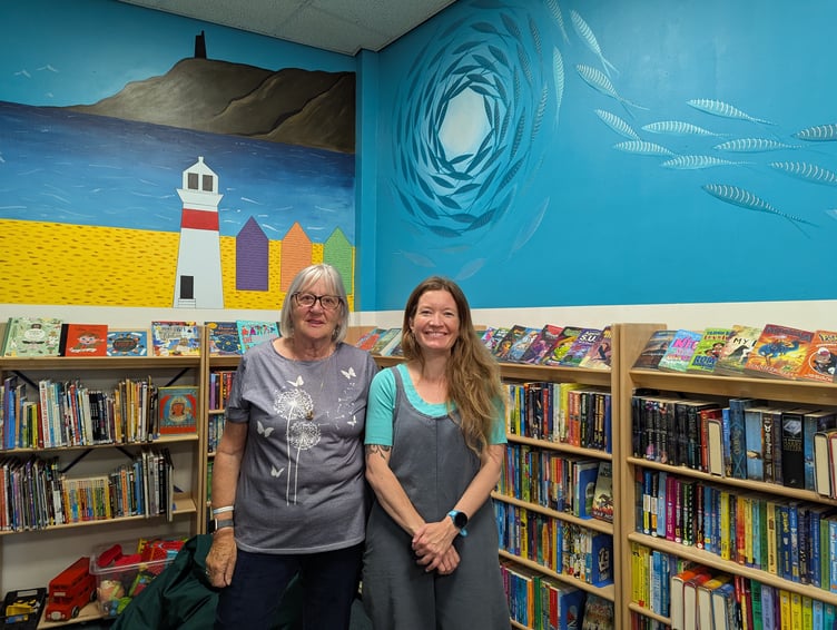 Miriam Jackson and Kate Summerville pictured with mural