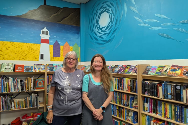 Miriam Jackson and Kate Summerville pictured with mural