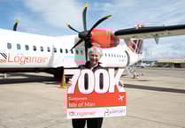 Loganair celebrates flying 700,000th customer through Ronaldsway