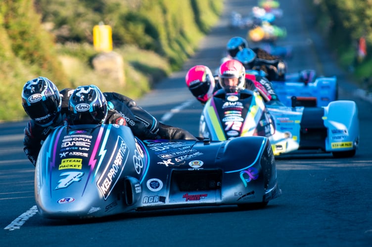 Jurby brothers Ryan and Callum Crowe enjoyed a thrilling battle with Pete Founds/Jevan Walmsley and Lee Crawford/Scott Hardie in the sidecar race on Wednesday evening. The lead changed hands numerous times and there were several comings together before the Crowes won the race by 6.229 seconds from Founds/Walmsley (Photo: Mark Corlett)