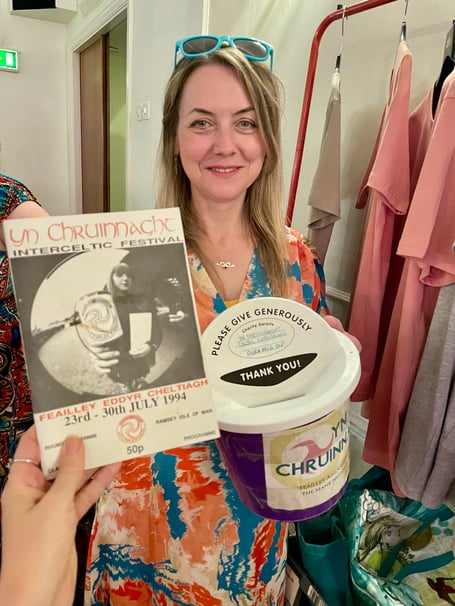 Chloe at last year’s Yn Chruinnaght festival with a photograph of her as a steward in 1993
