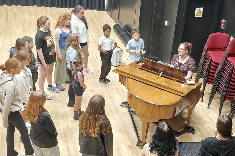 The young talent practicing ahead of the show