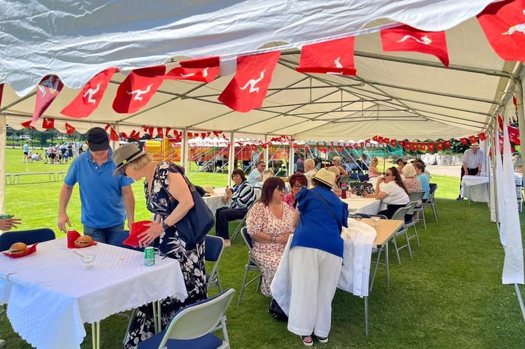 Many enjoyed food and drink under the gazebo, a bit of shelter from the sun