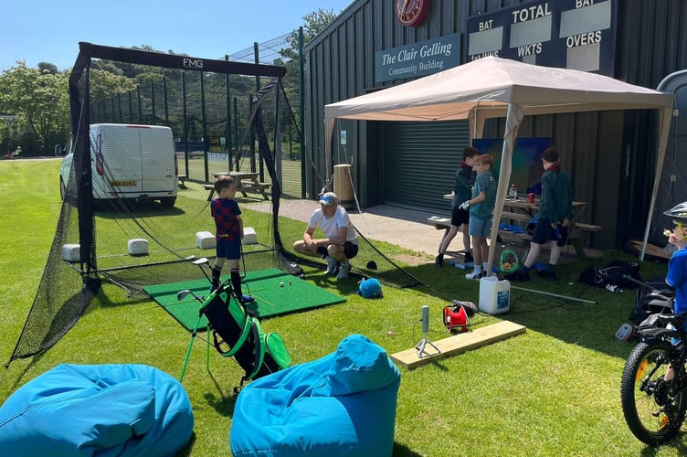 A new addition to this year's parish day, as Kevin Druggan put on a golf simulator for children and adults alike