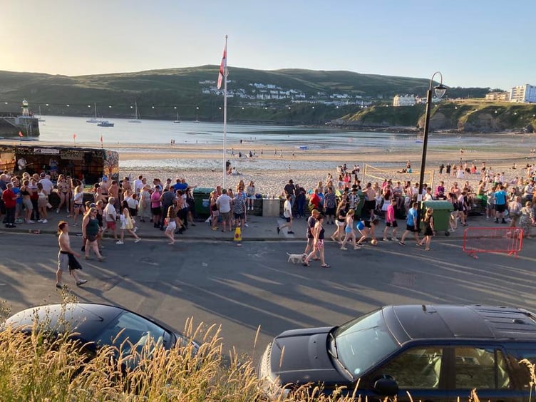 Crowds gather by the stage