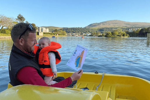 Dave Read, Venture Centre, navigates his family around the new permanent orienteering course on Mooragh Park Lake.