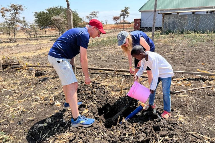 Volunteers from Capital International working at the site of the Huruma Project in Tanzania