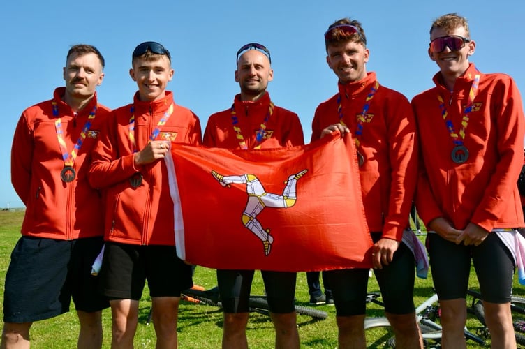The island's mountain bike team that collected a bronze medal on Tuesday