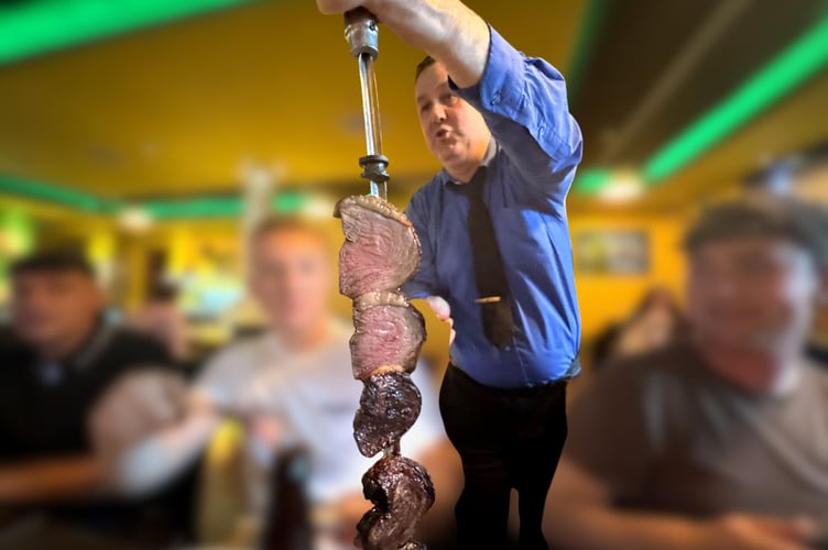 Sabor Brazil's Gilson carving the meat 