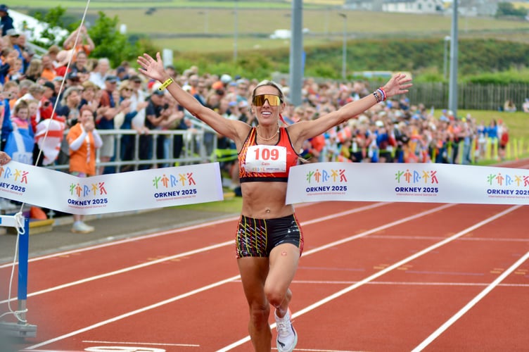 Christa Cain after winning her third Island Games gold medal of the week in Friday's half-marathon (Photo: Andy Dalrymple)
