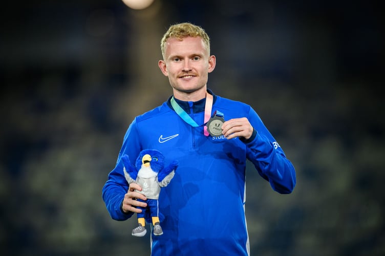 Rhine-Ruhr 2025 FISU Games | 23.07.2025 | Bochum | Lohrheidestadion | Athletics | Evening session | Men's 10.000m Medal Ceremony | David Steven MULLARKEY of United Kingdom of Great Britain and Northern Ireland | Â© Conny Kurth / Rhine-Ruhr 2025