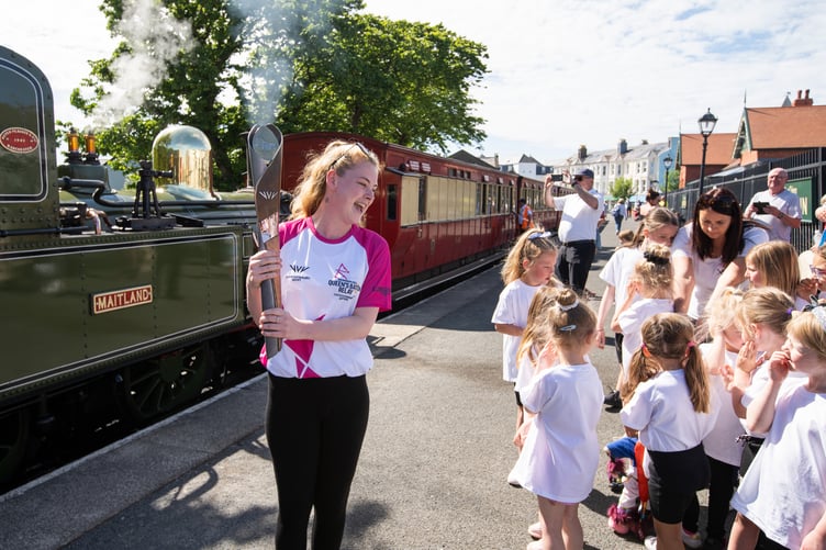 Batonbearer Claire Taylor at Port Erin Train Starion during the Queen's Baton Relay