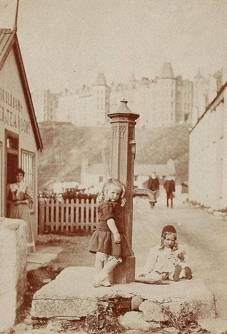 Children play outside St Catherine's Terrace at the turn of the 20th century
