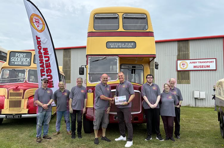 A pre-celebration of the 50th Anniversary of the Nationalisation of the buses for next year at the Jurby Motor Museum with a bright red Special Leyland (1964) and the Comet (1949) - primrose yellow and maroon livery colours (Photo - Lottie Watterson) 