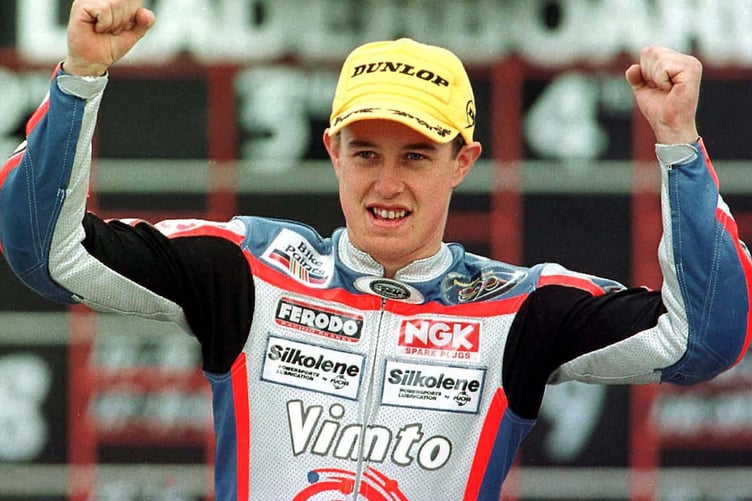 John McGuinness after winning the 1999 Lightweight TT