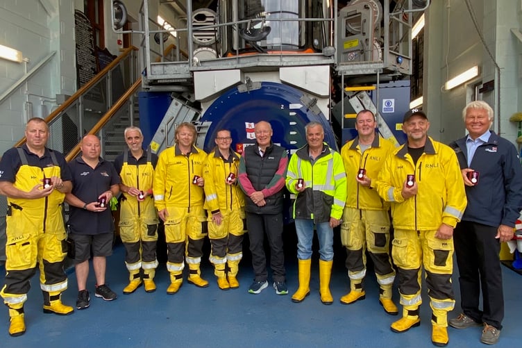 Lieutenant Governor Sir John Lorimer with nine of the ten Peel Lifeboat recipients of the King's Coronation Medals