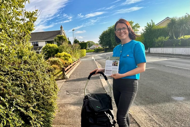 Sarah Maltby, MHK for Douglas South, delivers a Douglas South community newsletter that she publishes and hand-delivers to 2,800 homes during the Summer recess