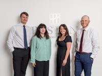 Six receive promotions in island office of Boston MFO