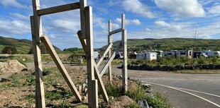 Power stays on at closed camp site despite planning breach concerns