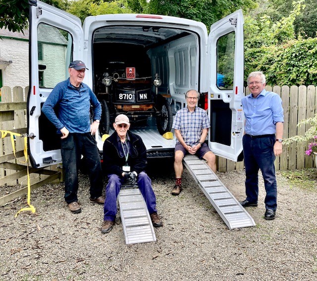 The team from Milntown with the 125-year-old car squeezed into the hired van