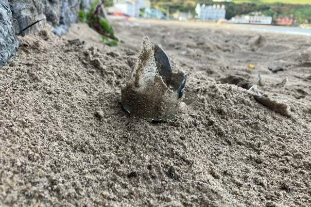 Broken glass bottle on Port Erin beach