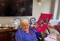 Jo celebrates 100th birthday: A century of calm, cake and chorus