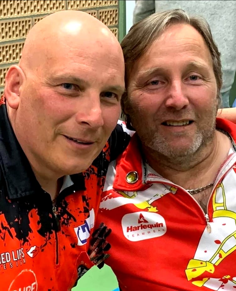 The Isle of Man's Darren Kennish (right) pictured with fellow darter Mike Callaghan