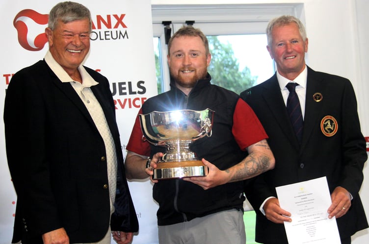 Robbie Noon (centre) with the WA Kirkpatrick Trophy alongside Isle of Man Golf president Gary Ashe (right) and Simon Kirkpatrick from sponsor Manx Petroleum