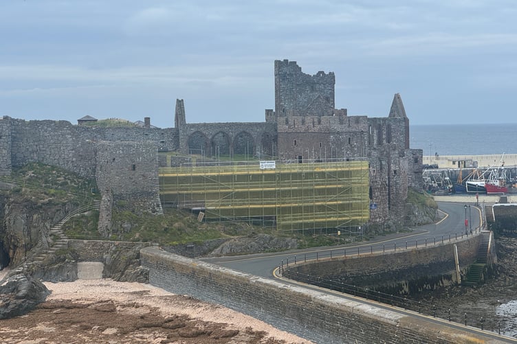 Visitors to St Patrick’s Isle can currently see scaffolding wrapped in yellow mesh along the curtain wall of Peel Castle (Photo - Tom Curphey)
