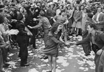 Dancing around a bonfire at Ronaldsway as Japan surrenders