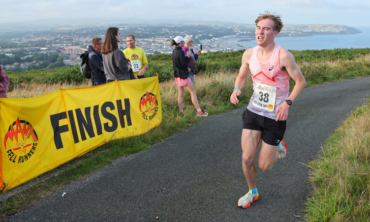 Ryan Corrin approaches the finish line en route to winning the Manx Fell Runners-organised Killer Mile on Wednesday evening. The race formed part of this week's No Rest for the Wicked series (Photo: Dave Kneen Photography)