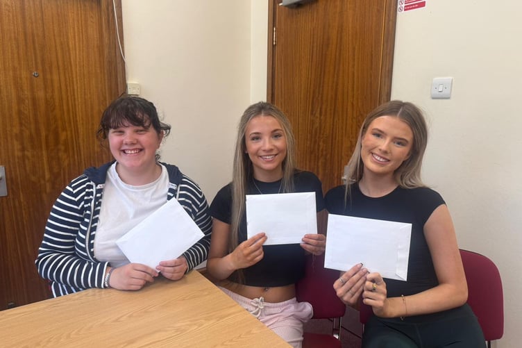 QEII students Rebecca Cooil, Bel Hughes and Ealish Ayres receive A-level results