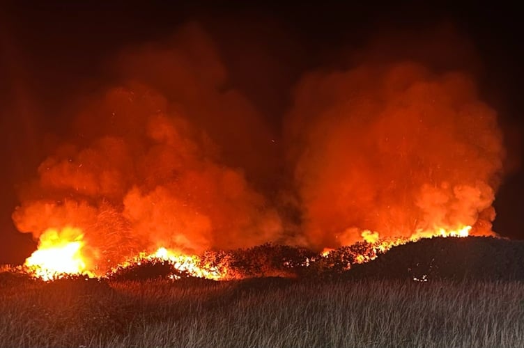 Large grass fire just outside Ramsey