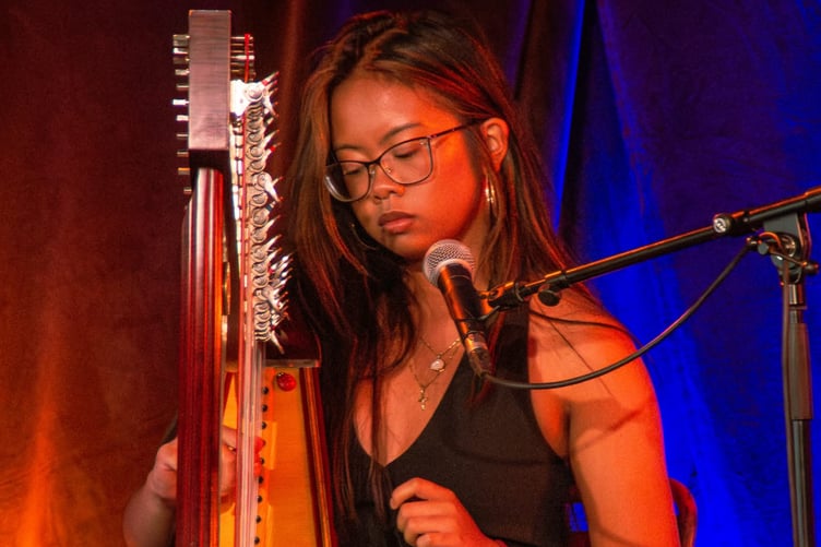 Arabella Ayen plays harp at the Festival Interceltique de Lorient