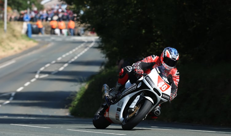 Local man Grant Thomson was the second highest newcomer in Monday's Junior Manx Grand Prix, bringing his Kawasaki home in ninth place (Photo: Callum Staley/CJS Photography)