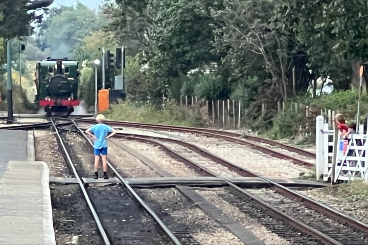 Children playing chicken with train at Athol Park crossing