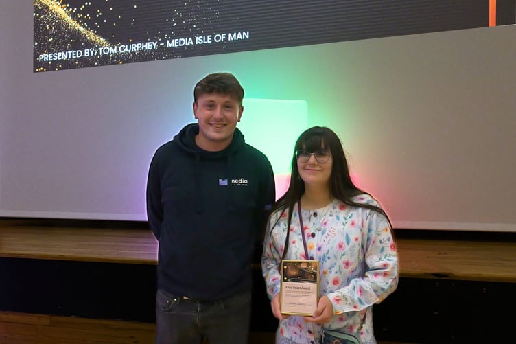 Media Isle of Man's Tom Curphey presenting Karmen St John-Cain an award for her animated music video