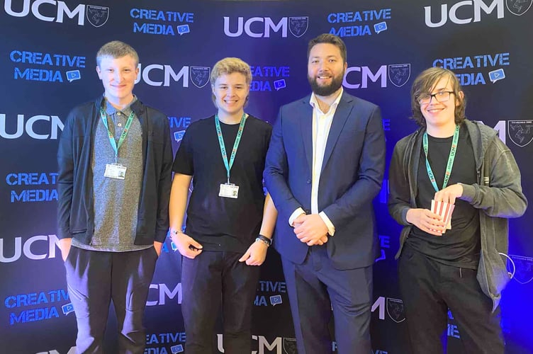 University College Isle of Man's Ewan MacFarlane with some of the creative media pupils