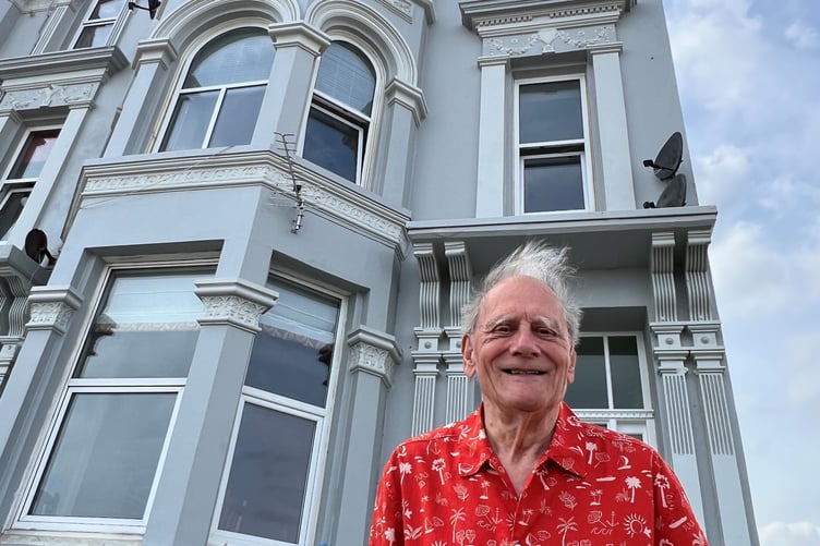 Leslie Darbyshire outside the former YHA hostel on Mooragh Promenade, Ramsey where he stayed in 1955